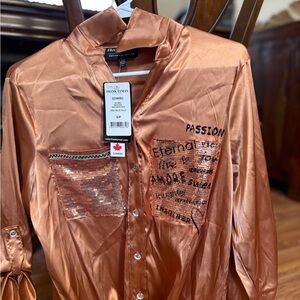 Frank Lyman Design Women’s Copper Shirt with Sequin Accents.